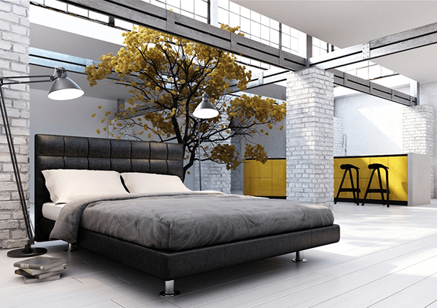 white industrial bedroom with bright yellow accents