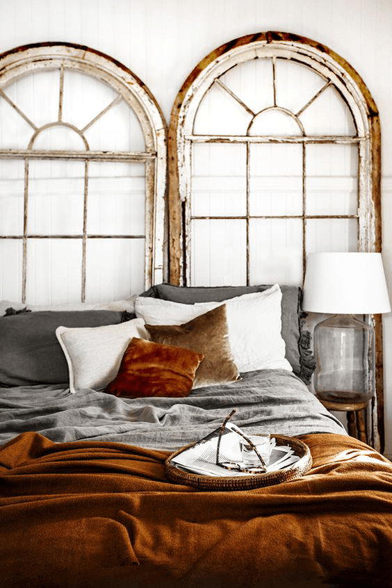 white bedroom with copper orange bedding