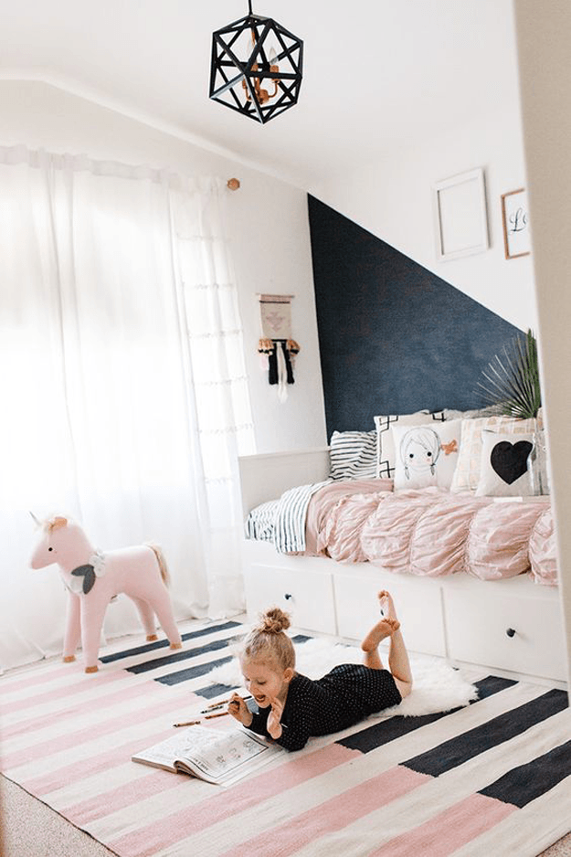 girls bedroom with black and pink accents