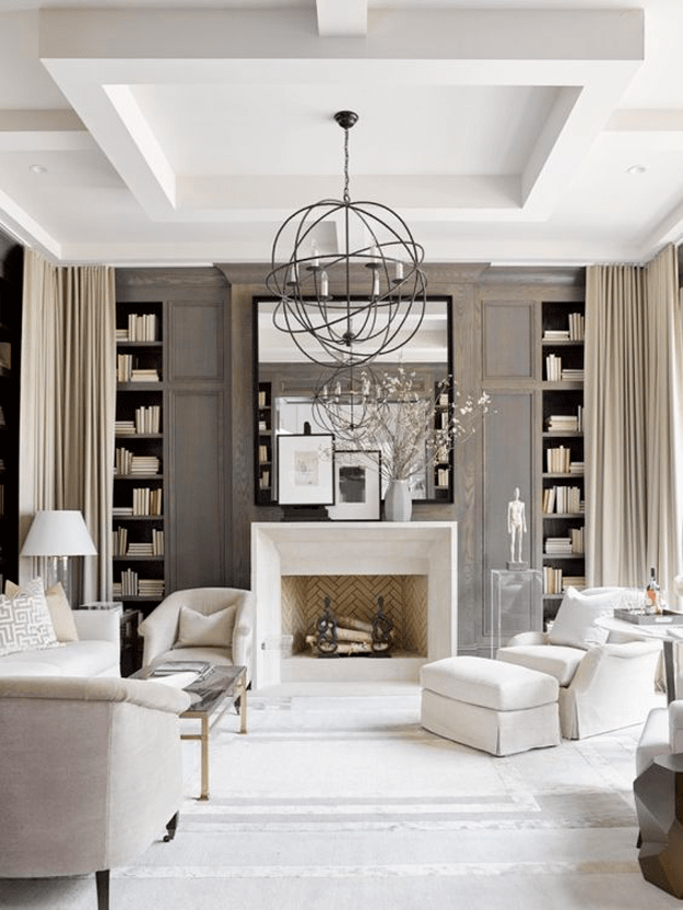 white living room with dark taupe wood paneling