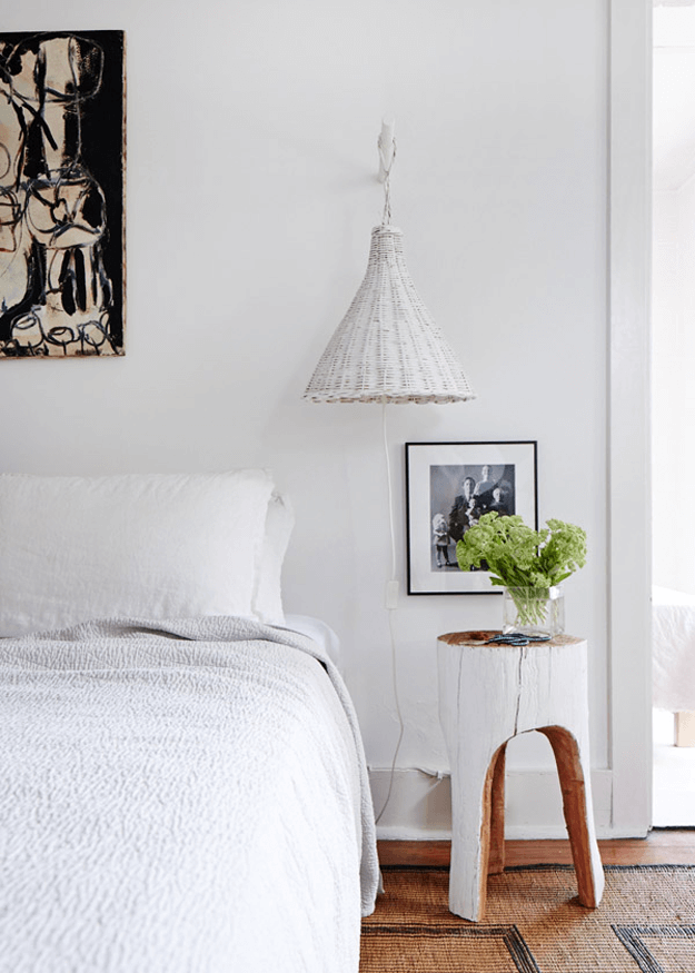 white minimalist bedroom bright green flowers