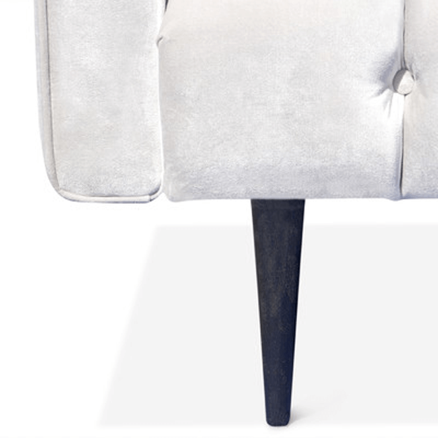 white sofa with mid-century leg