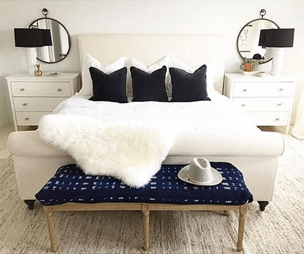 ivory white sheepskin throw in contemporary bedroom