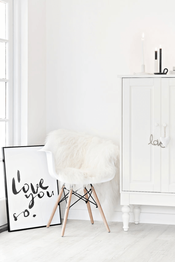 whitesheepskinthrowdrapedoverchairinwhiteinterior Concepts