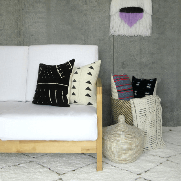 tribal style living room with mudcloth pillows