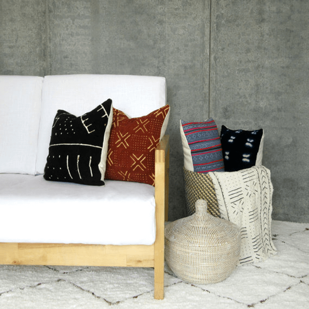 tribal style living room with black mudcloth pillow