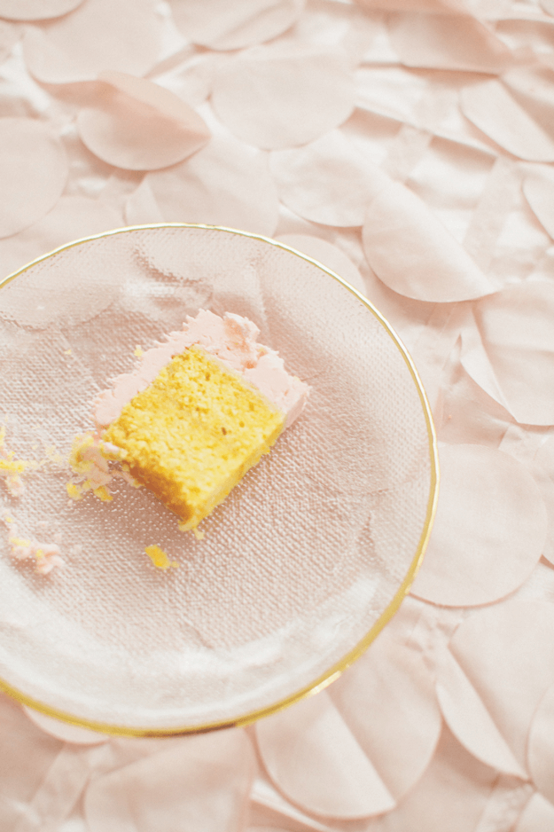 yellow cake with blush pink icing
