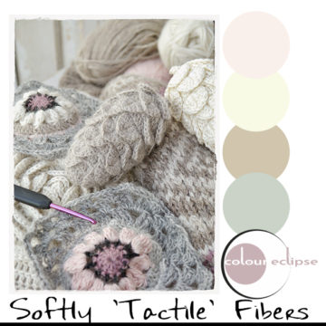 pile of yarns and crochet work with color palette