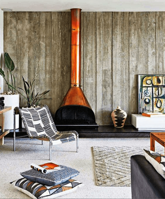 modern rustic living room with copper orange freestanding fireplace