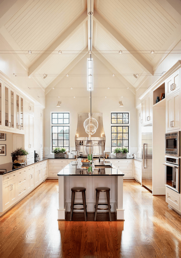 creamy white kitchen with cathedral ceiling