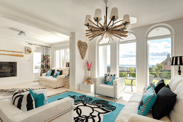 beach style living room with turquoise accents