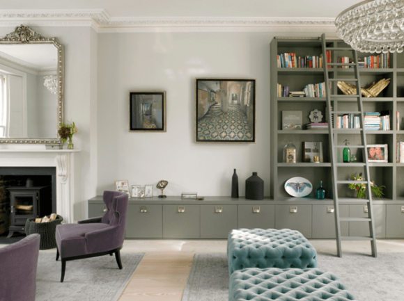 living room with olive green built-in shelves