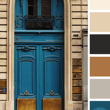 teal blue door in tan stone wall