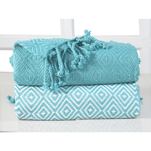 turquoise throws white window sill