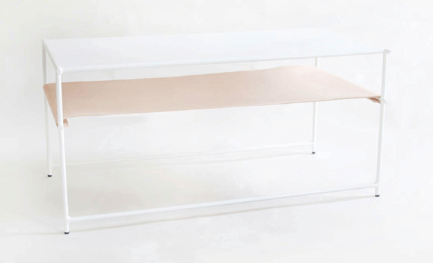 white modern coffee table with pantone hazelnut shelf