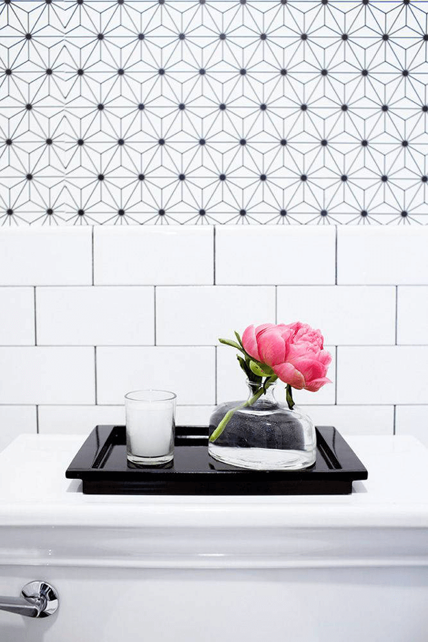 black and white bathroom with hot pink accent