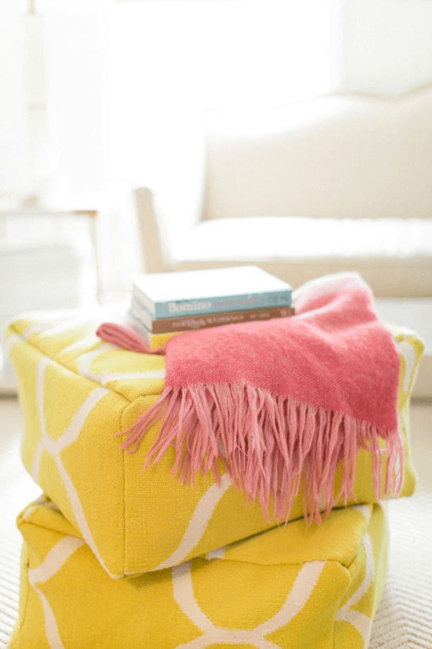 creamy white living room yellow coral pink accents