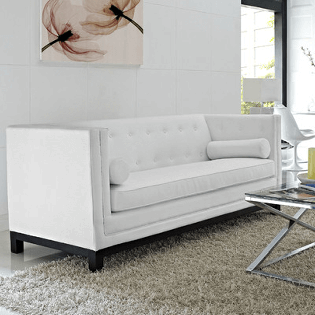 white boxy modern sofa in white living room