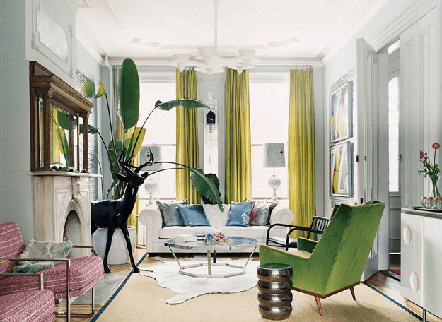 eclectic living room with moss green modern chair