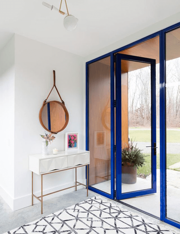 white modern home entry with bright blue entry