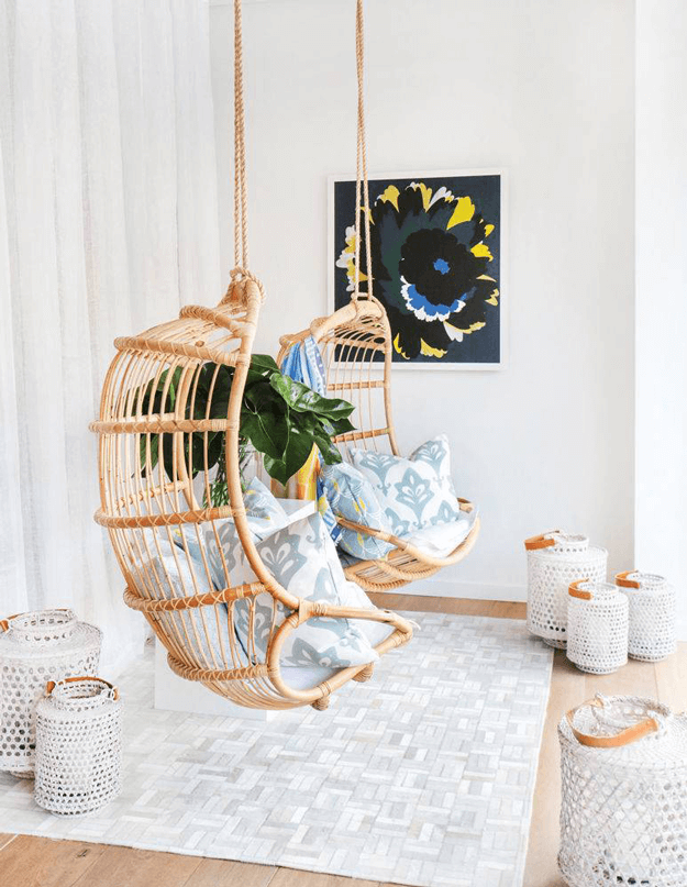 hanging swing chairs in white room