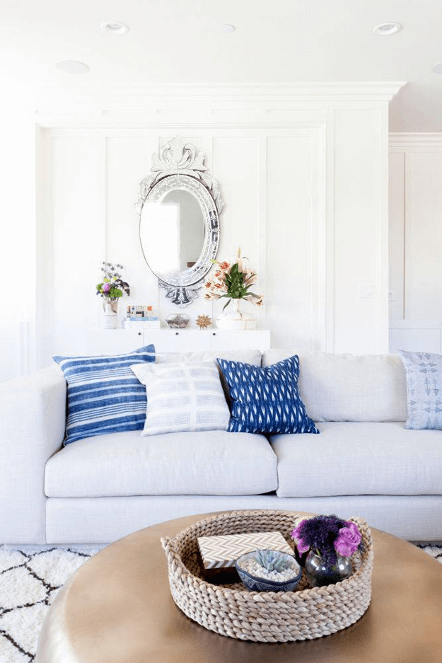 dreamy white living room lapis blue accents