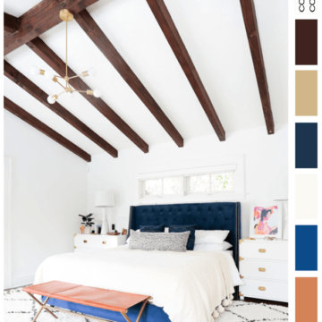 white bungalow bedroom with dark wood beams