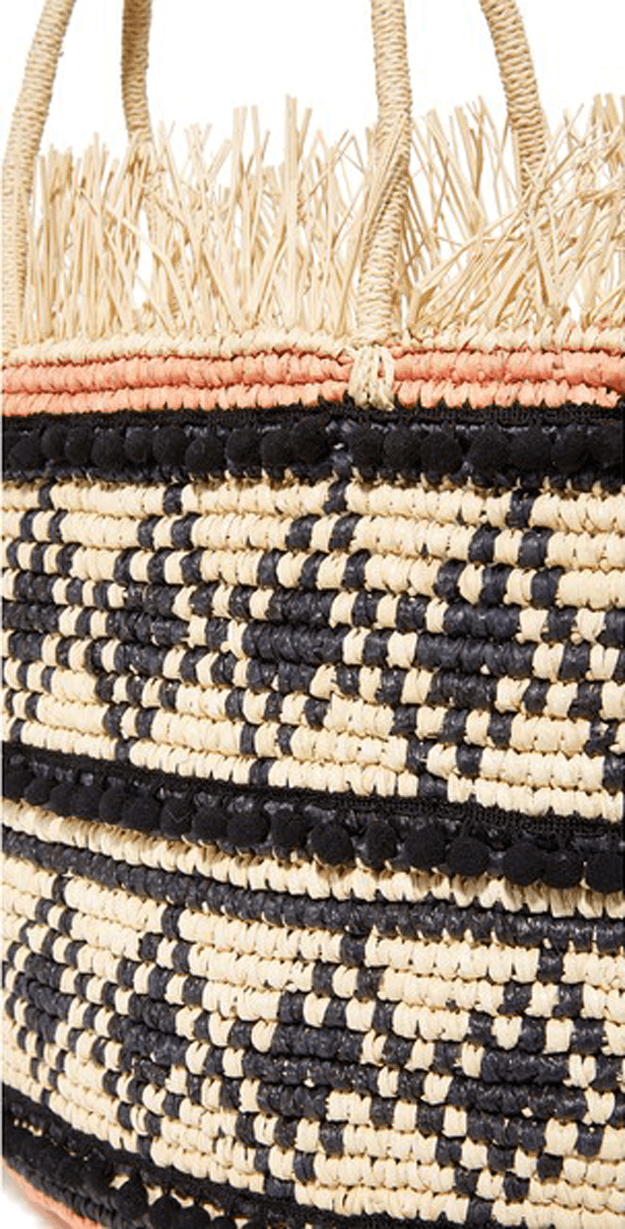 natural straw bag with black accents