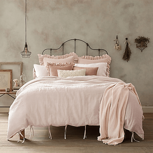 light-pink-bedding-on-vintage-style-metal-bed-benjamin-moore-pink-bliss ...