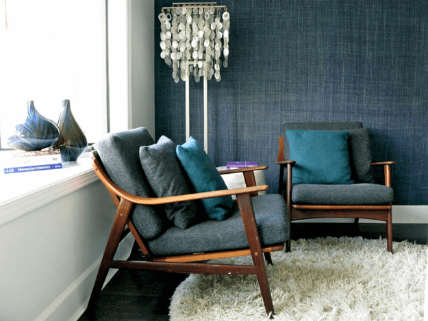 mid-century modern chairs with teal pillows