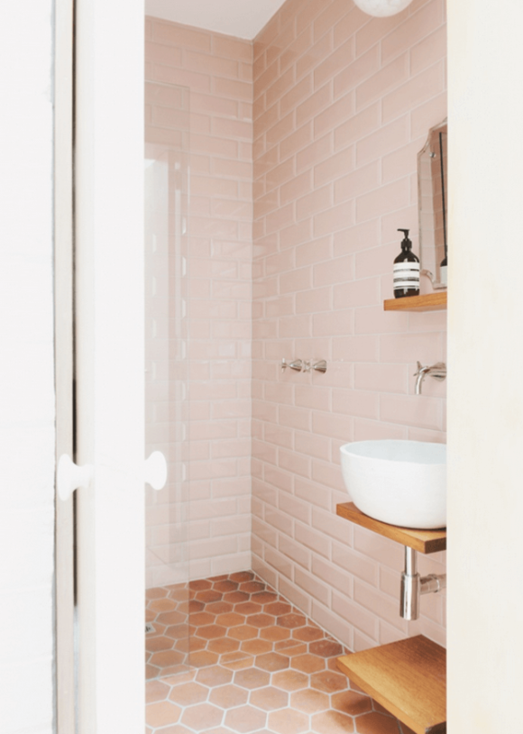 blush pink and copper brown bathroom