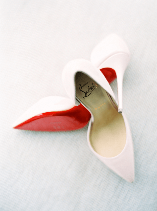 pale pink high heels with bright red sole