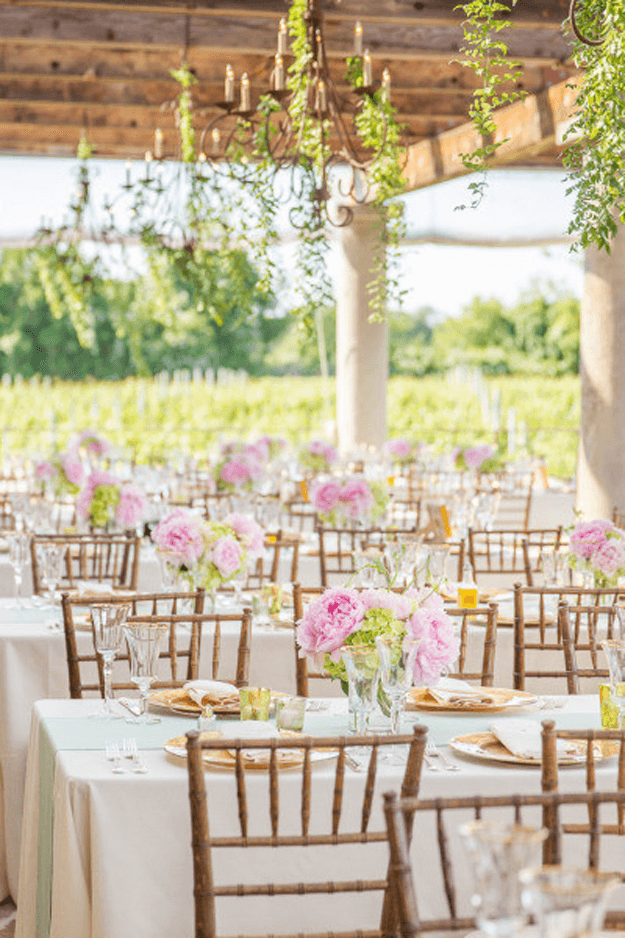 outdoor vineyard wedding with blush pink flowers