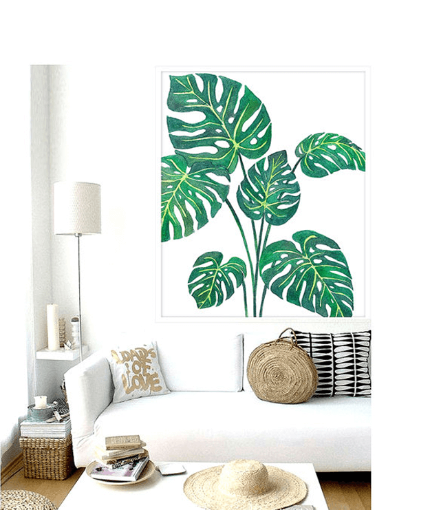 white modern living room with palm leaf poster