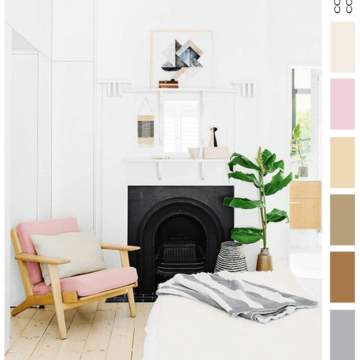 white bedroom with blush pink chair and light wood