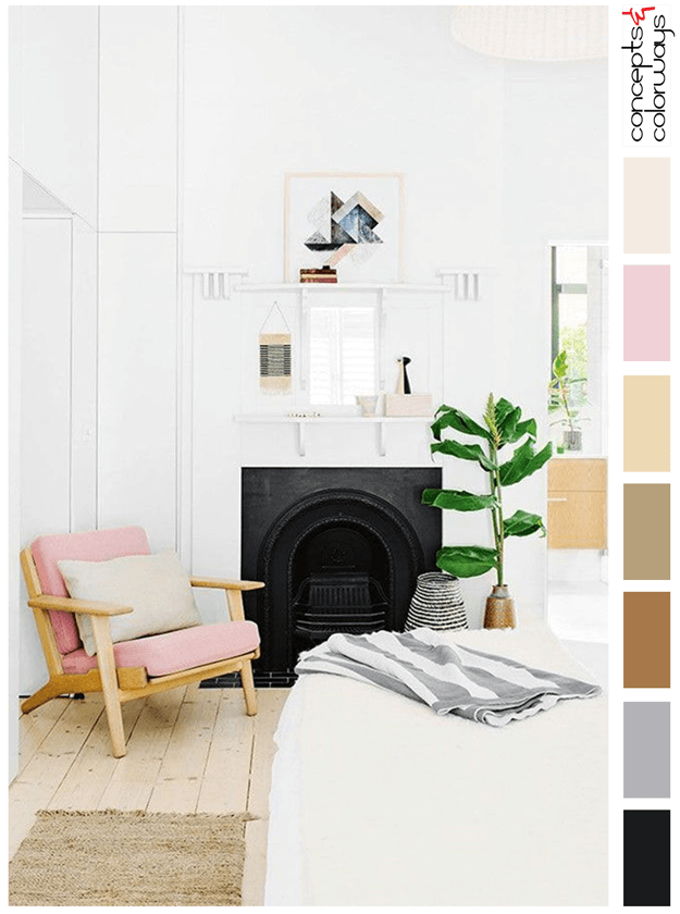 white bedroom with blush pink chair and light wood