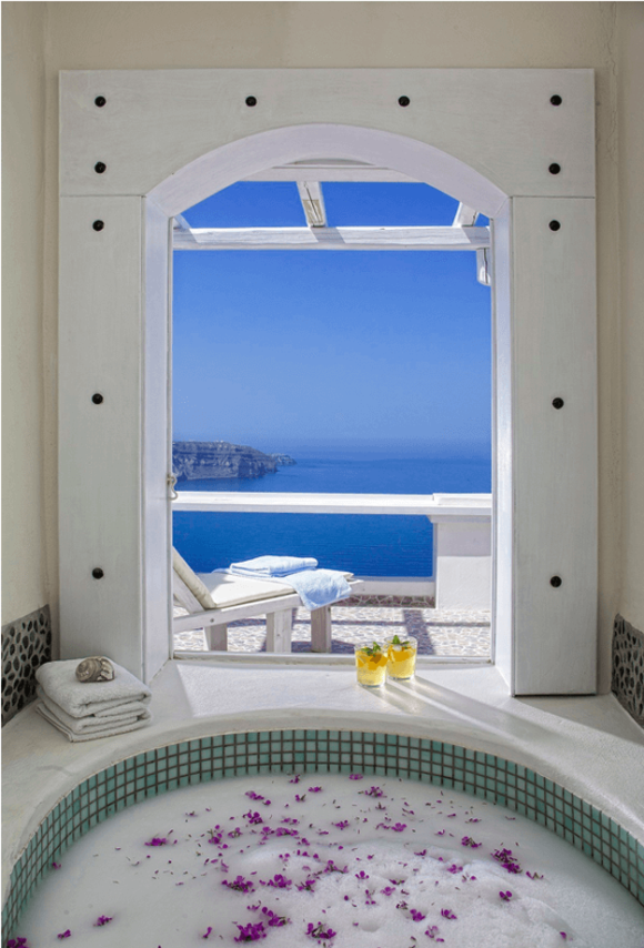 Santorini hotel with bright blue sea view