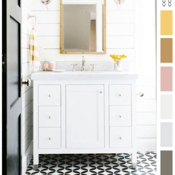 pink and yellow, black and white bathroom, bright yellow, black and white, ochre, blush pink, black and white tile, black door, white marble, white shiplap, yellow flowers, white vanity cabinet, glass globe wall sconce, bamboo mirror, yellow striped towels, towel ring